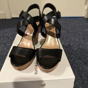 Black Wedge Sandals with Strappy Design and Cork Heel